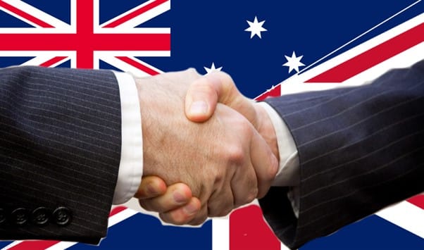 Picture showing a hand shake from UK and Australia businessmen.